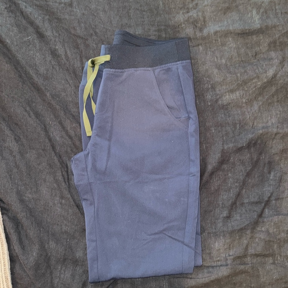 Blue/grey Figs joggers with green tie